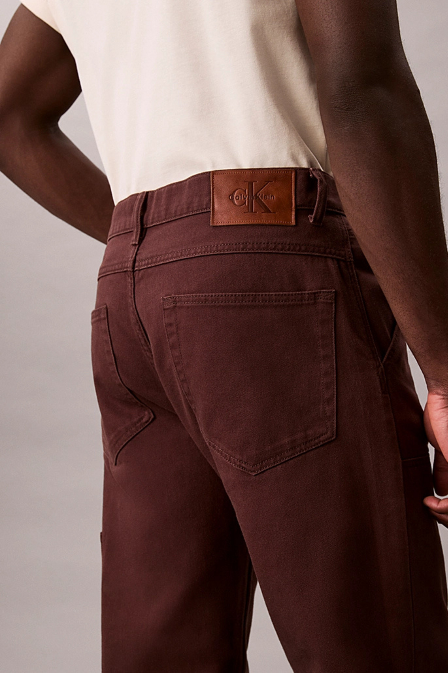 Calças Bordô Calvin Klein FW25